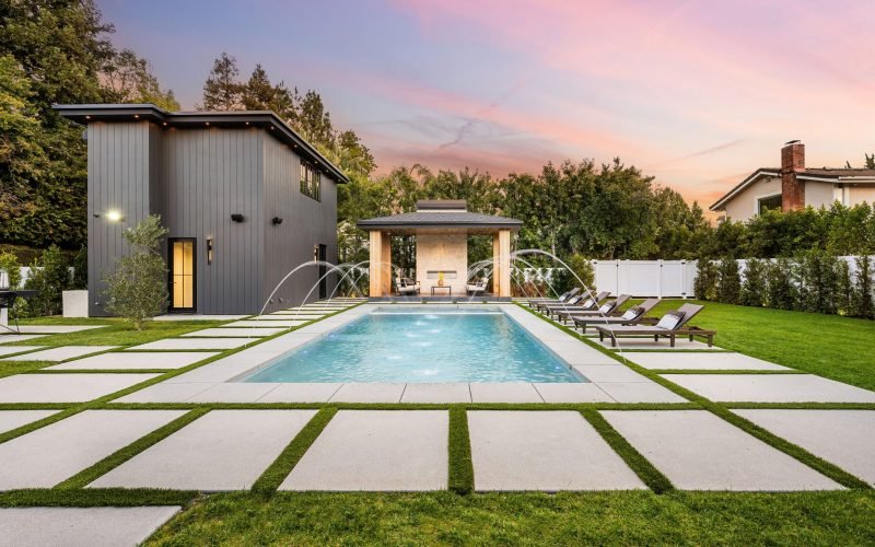 modern-backyard-pool-with-lounge-chairs-2025-02-10-06-40-21-utc-scaled-rirrc82la2907lllr4ux0y38v9c89bb65jjoyutsi0